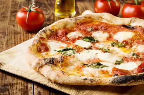 Neapolitan Pizza with buffalo mozzarella and basil
